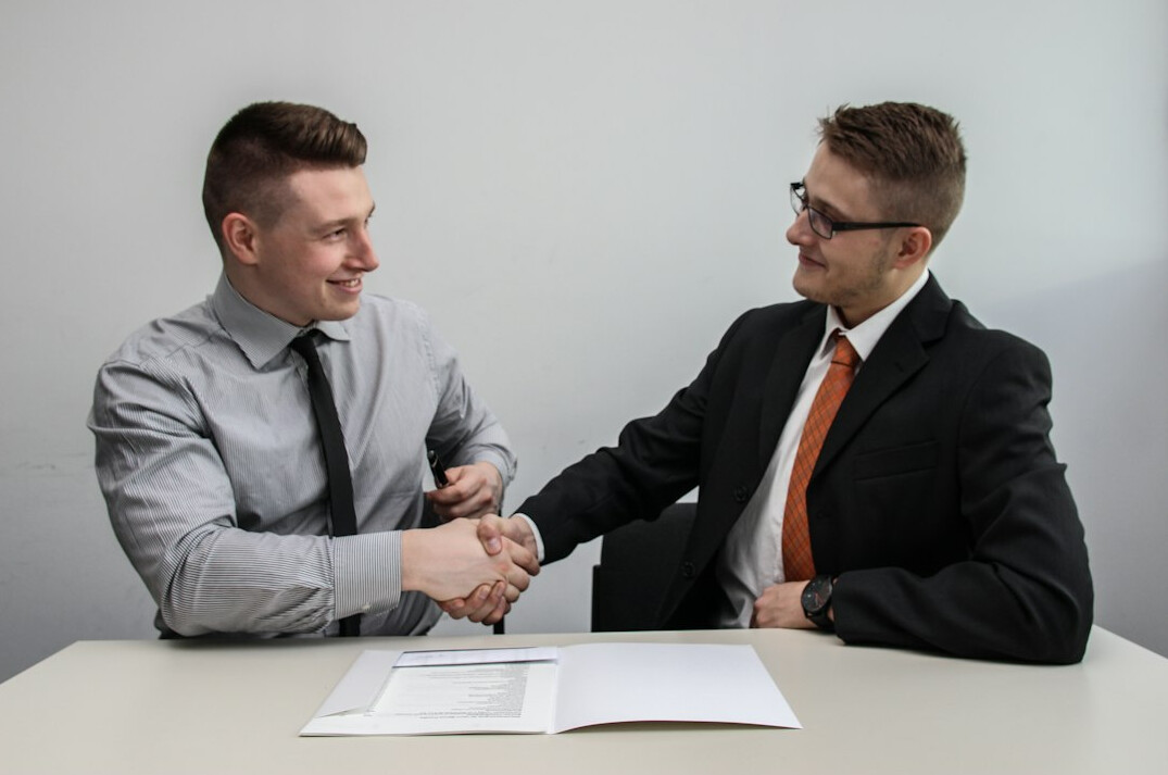business handshake success