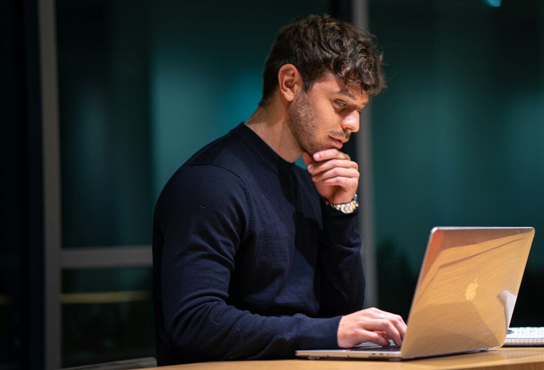 programmer working on laptop